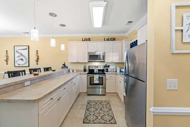 $259,900 | 4895 Luster Leaf Circle, Unit 104, Myrtle Beach, SC 29577