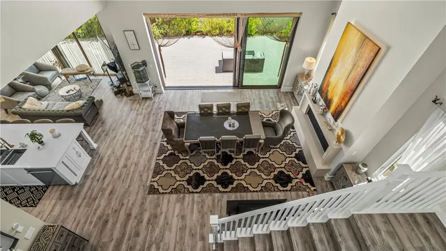 a living room with fireplace furniture and a flat screen tv