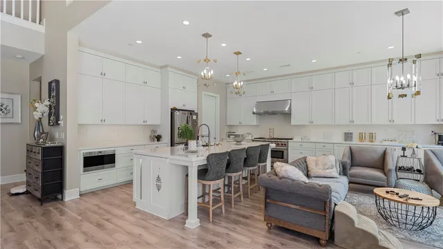 a bathroom with a sink double vanity and a mirror