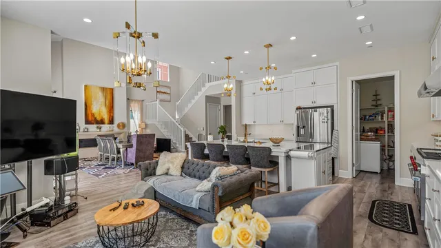 a bedroom with a bed and a wooden floor