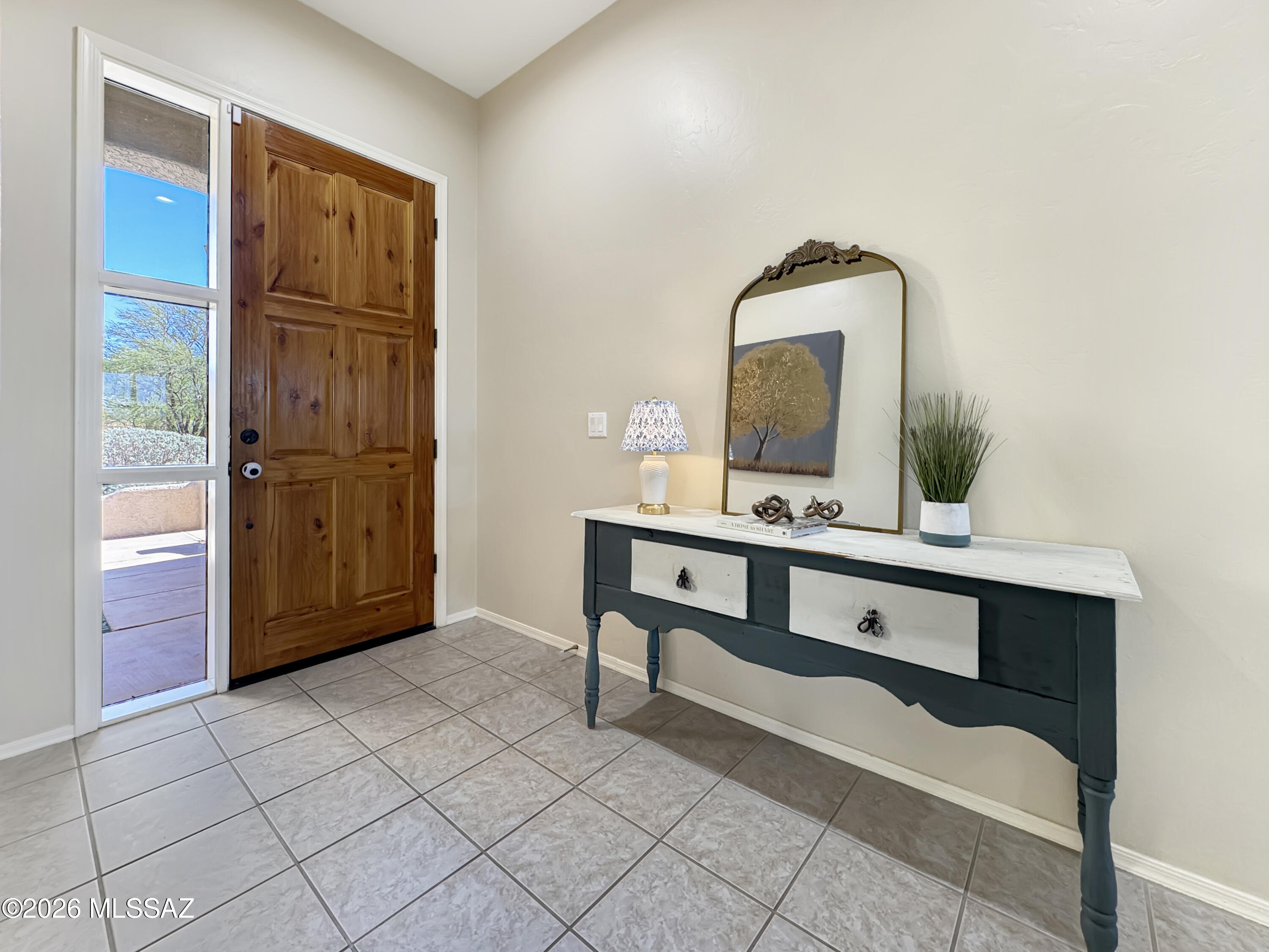 10835 South Heart Break Ridge Place Vail, AZ 85641 - Photo 8 of 49 a bathroom with a sink a mirror and vanity