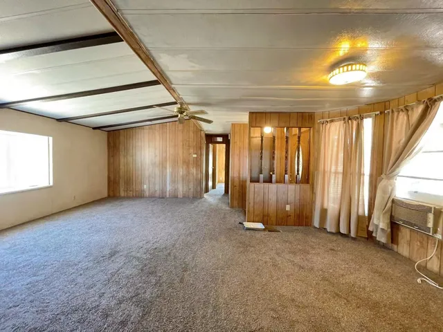 a kitchen with a stove a sink a refrigerator and a oven