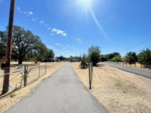 a view of swimming pool with outdoor seating
