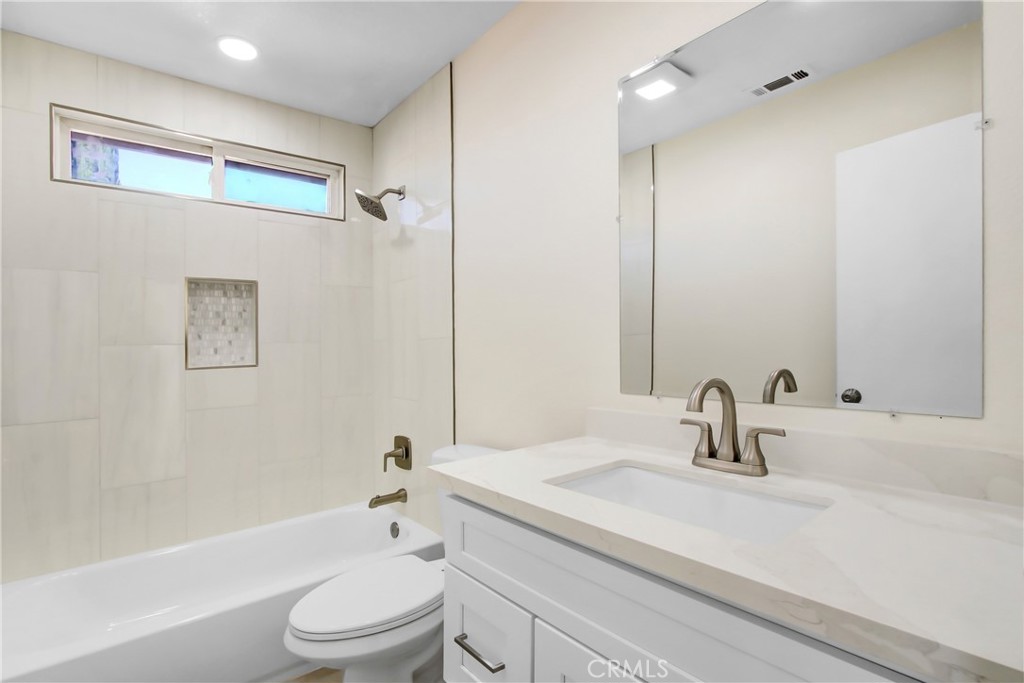 44738 Corte Gutierrez Temecula, CA 92592 - Photo 15 of 24 a bathroom with a sink a toilet and shower