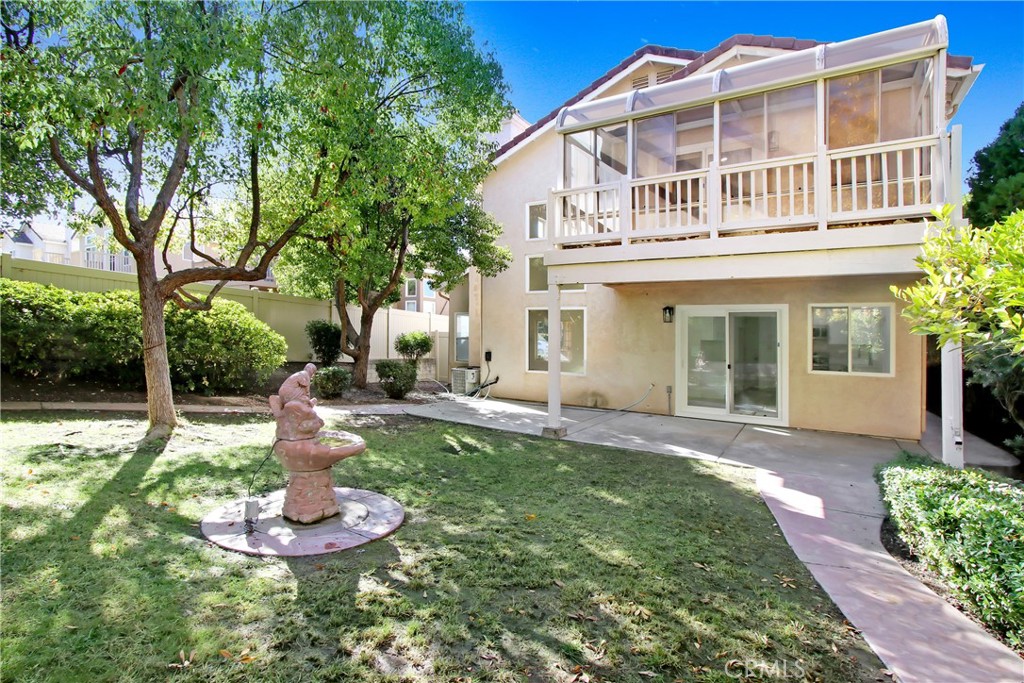 44738 Corte Gutierrez Temecula, CA 92592 - Photo 23 of 24 a front view of a house with a yard garage and outdoor seating