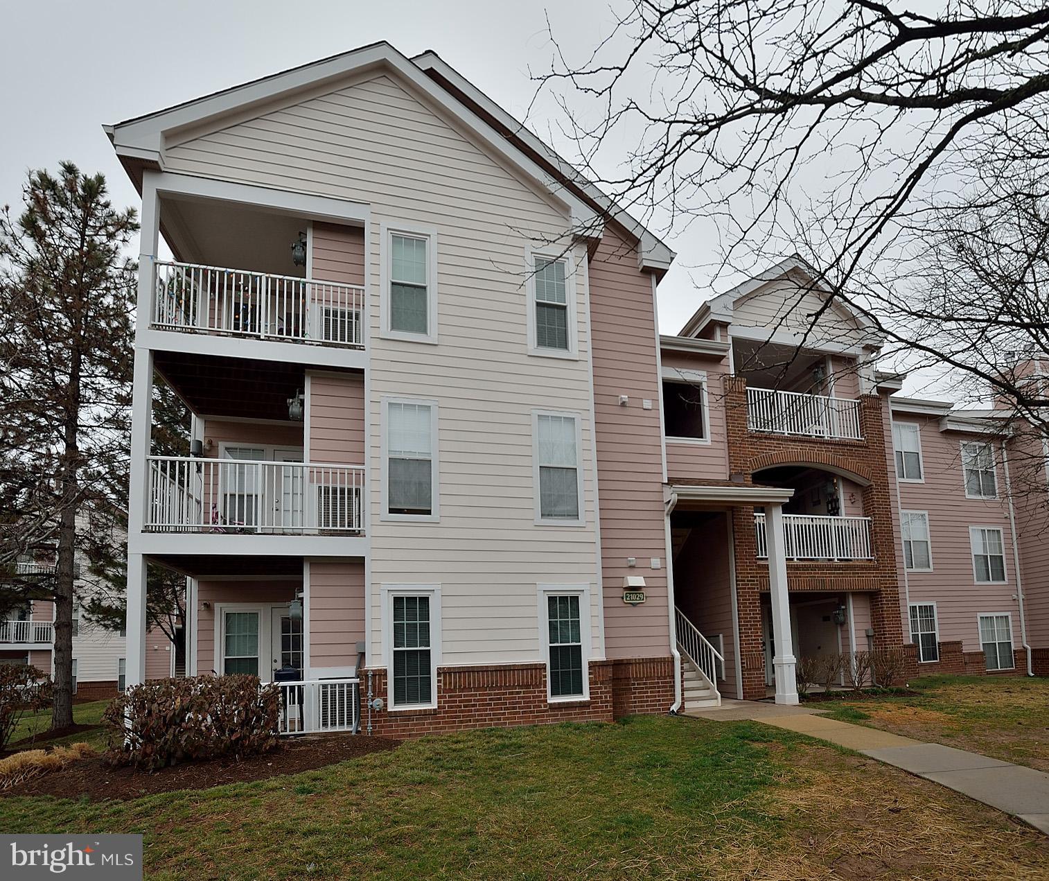 21029 Timber Ridge Terrace, Unit 101 Ashburn, VA 20147 - Photo 1 of 17 Exterior (Front)
