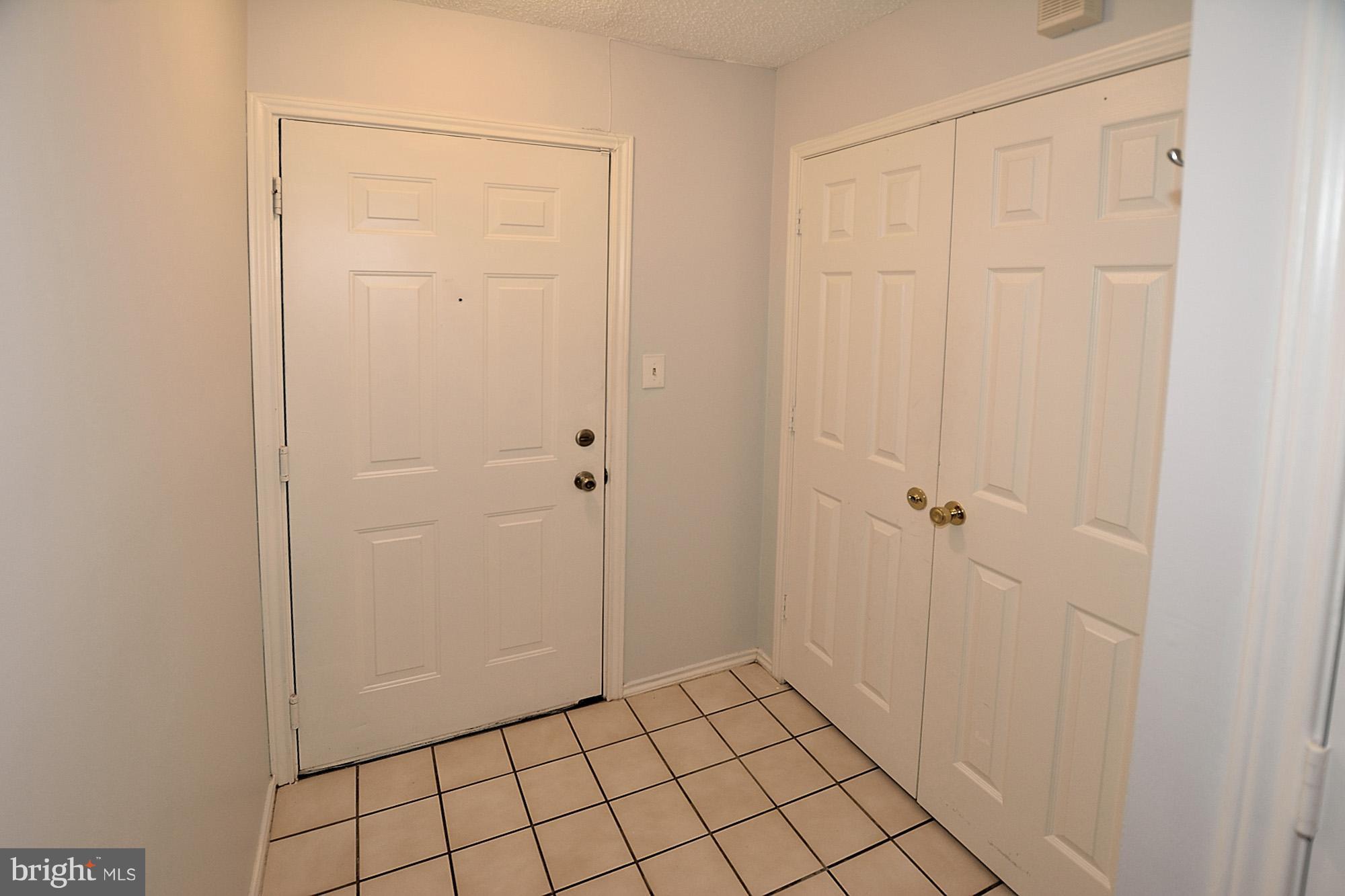 21029 Timber Ridge Terrace, Unit 101 Ashburn, VA 20147 - Photo 2 of 17 Foyer