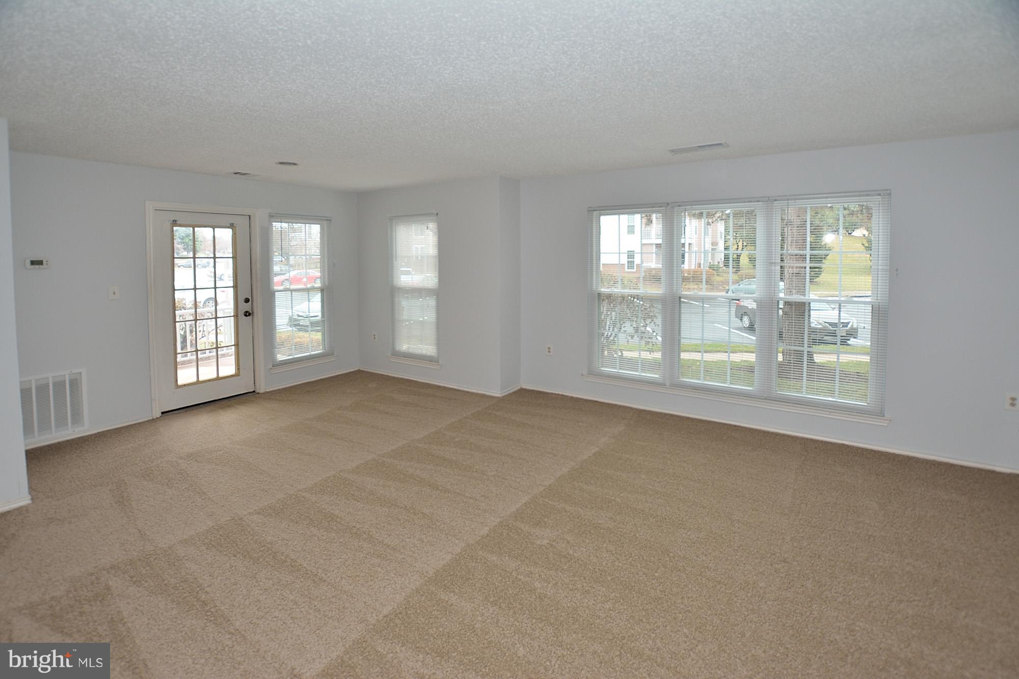 21029 Timber Ridge Terrace, Unit 101 Ashburn, VA 20147 - Photo 3 of 17 Living Room