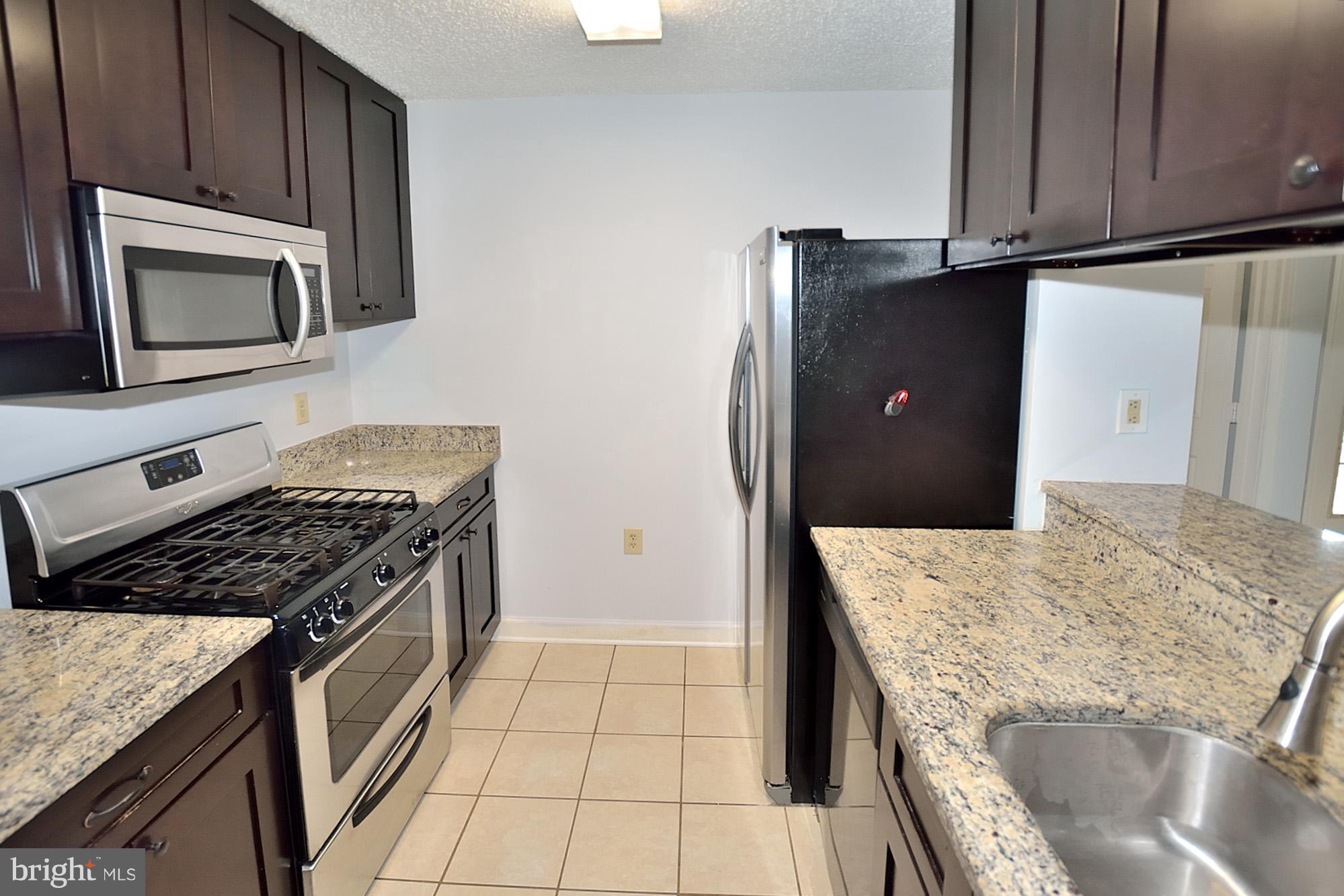 21029 Timber Ridge Terrace, Unit 101 Ashburn, VA 20147 - Photo 7 of 17 Kitchen
