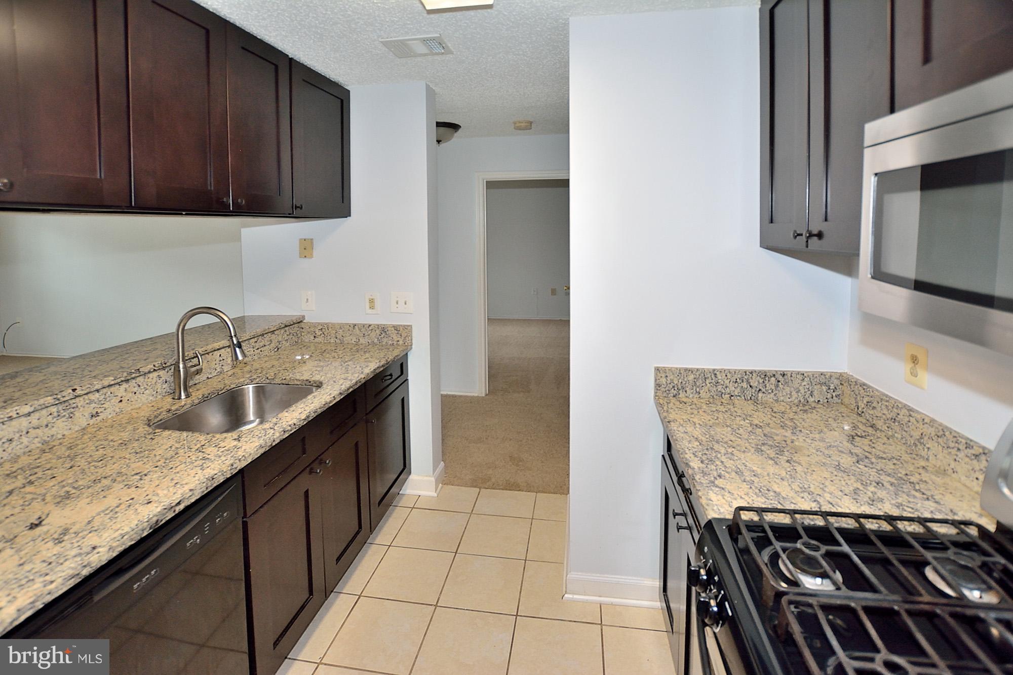 21029 Timber Ridge Terrace, Unit 101 Ashburn, VA 20147 - Photo 8 of 17 Kitchen