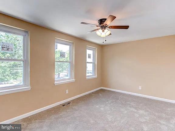 1309 East Madison Street Baltimore, MD 21205 - Photo 11 of 20 a view of an empty room with a window