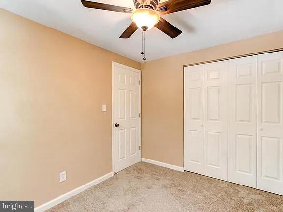 1309 East Madison Street Baltimore, MD 21205 - Photo 15 of 20 a view of an empty room and chandelier fan