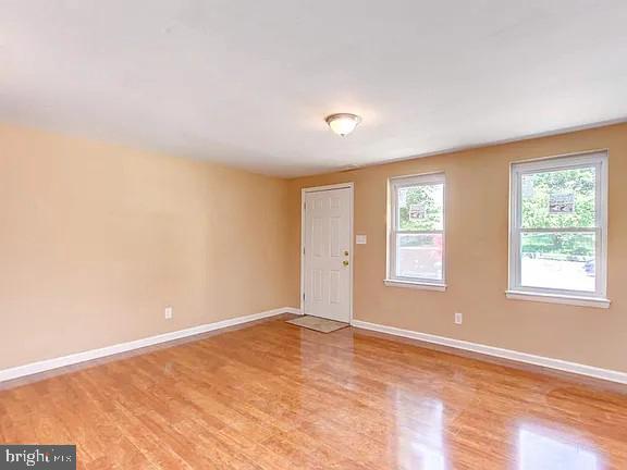 1309 East Madison Street Baltimore, MD 21205 - Photo 3 of 20 a view of an empty room with a window