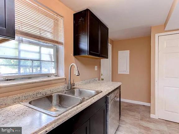 1309 East Madison Street Baltimore, MD 21205 - Photo 10 of 20 a kitchen with a sink and a window