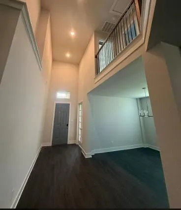 a view of entryway with wooden floor