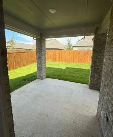 a view of gallery with wooden floor