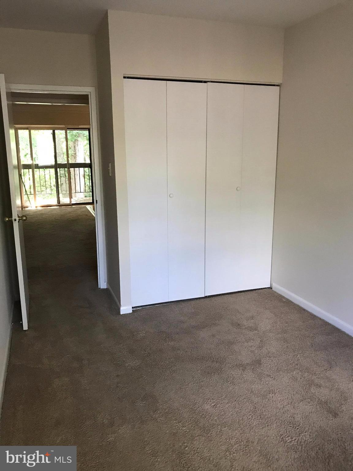11629 Stoneview Square, Unit 21C Reston, VA 20191 - Photo 21 of 30 a view of an empty room with a window