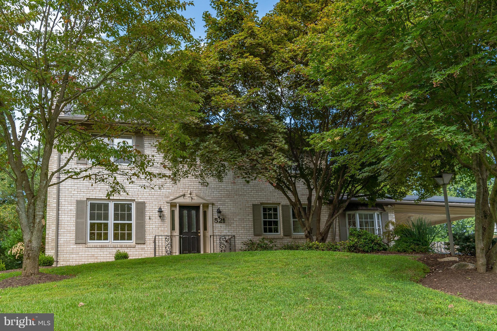 521 Beaumont Road Silver Spring, MD 20904 - Photo 2 of 30 a front view of a house with a garden