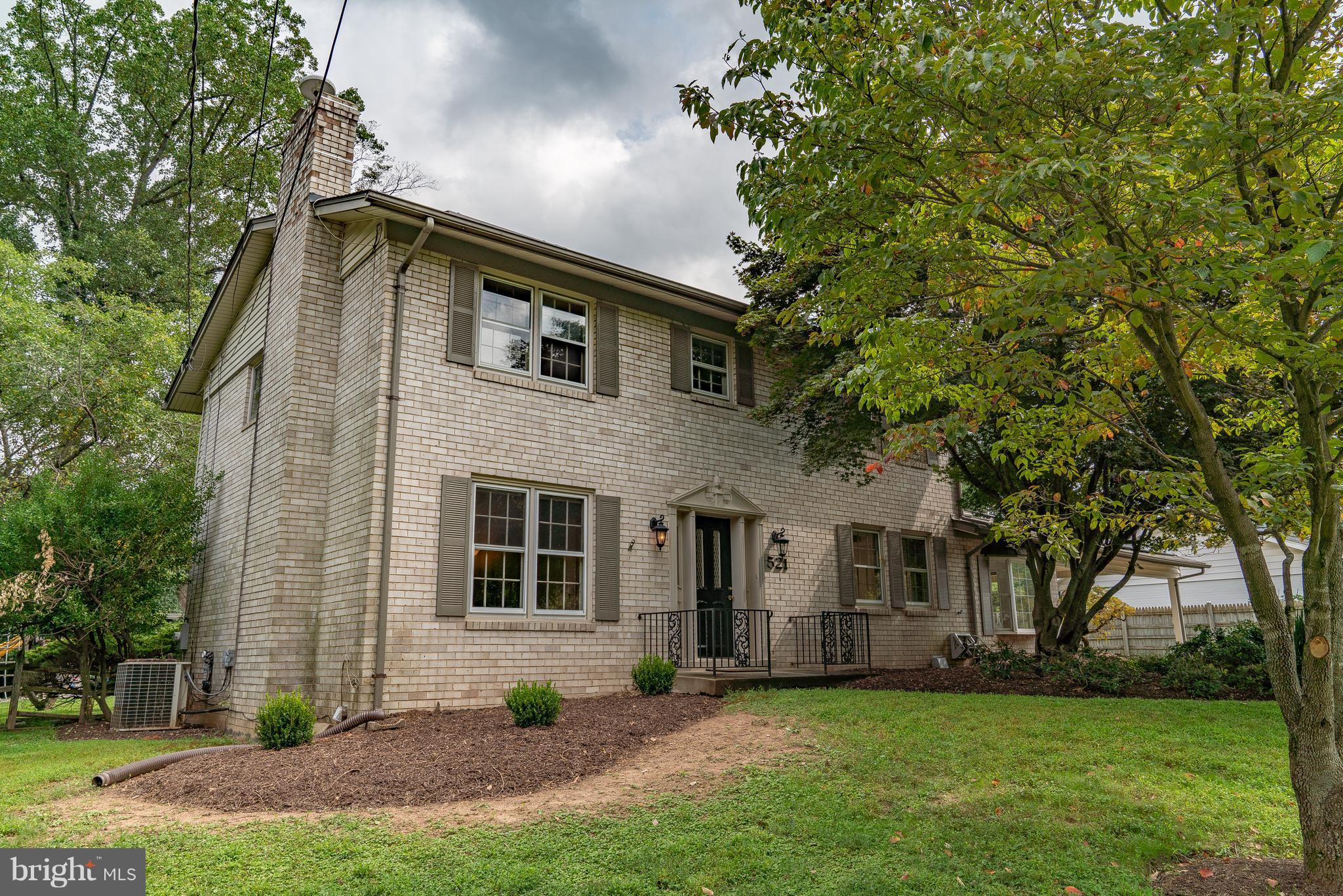 521 Beaumont Road Silver Spring, MD 20904 - Photo 3 of 30 a front view of a house with a garden