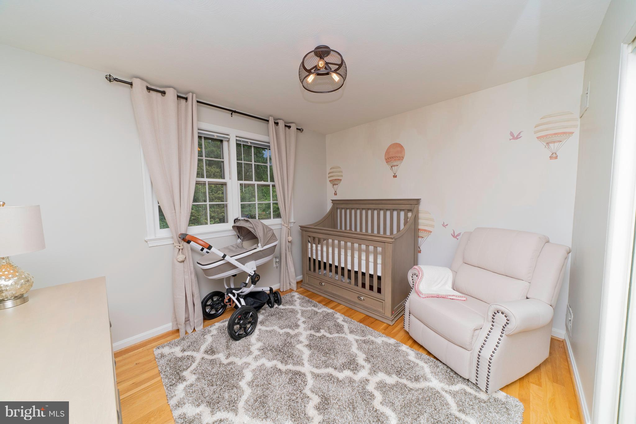 521 Beaumont Road Silver Spring, MD 20904 - Photo 24 of 30 a view of livingroom with furniture and windows