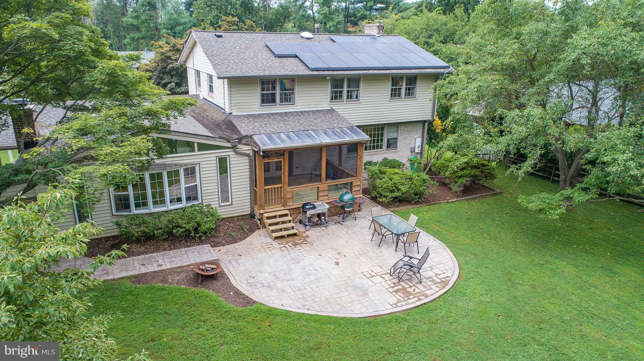 521 Beaumont Road Silver Spring, MD 20904 - Photo 5 of 30 a view of a house with a yard patio and a garden