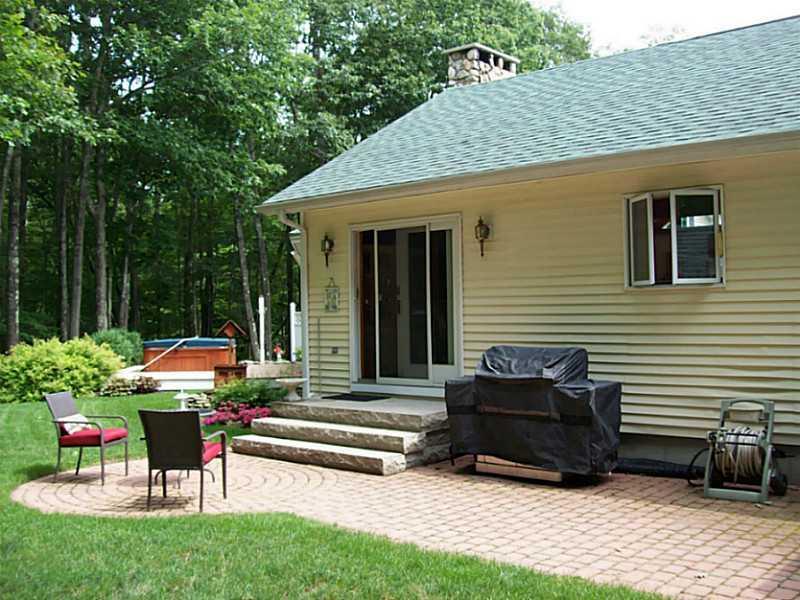 65 Frost Road Lyman, ME 04002 - Photo 8 of 34 Exterior Back. Hardscaped patio...