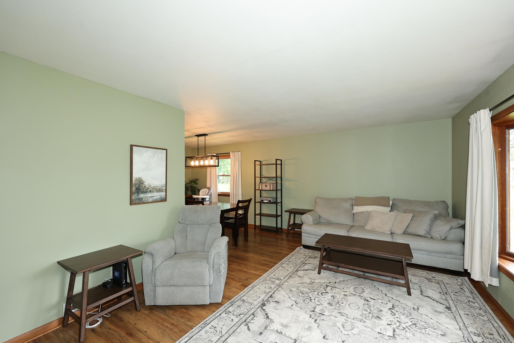 1408 South Emmertsen Road Mount Pleasant, WI 53406 - Photo 2 of 32 Living Room with newer flooring