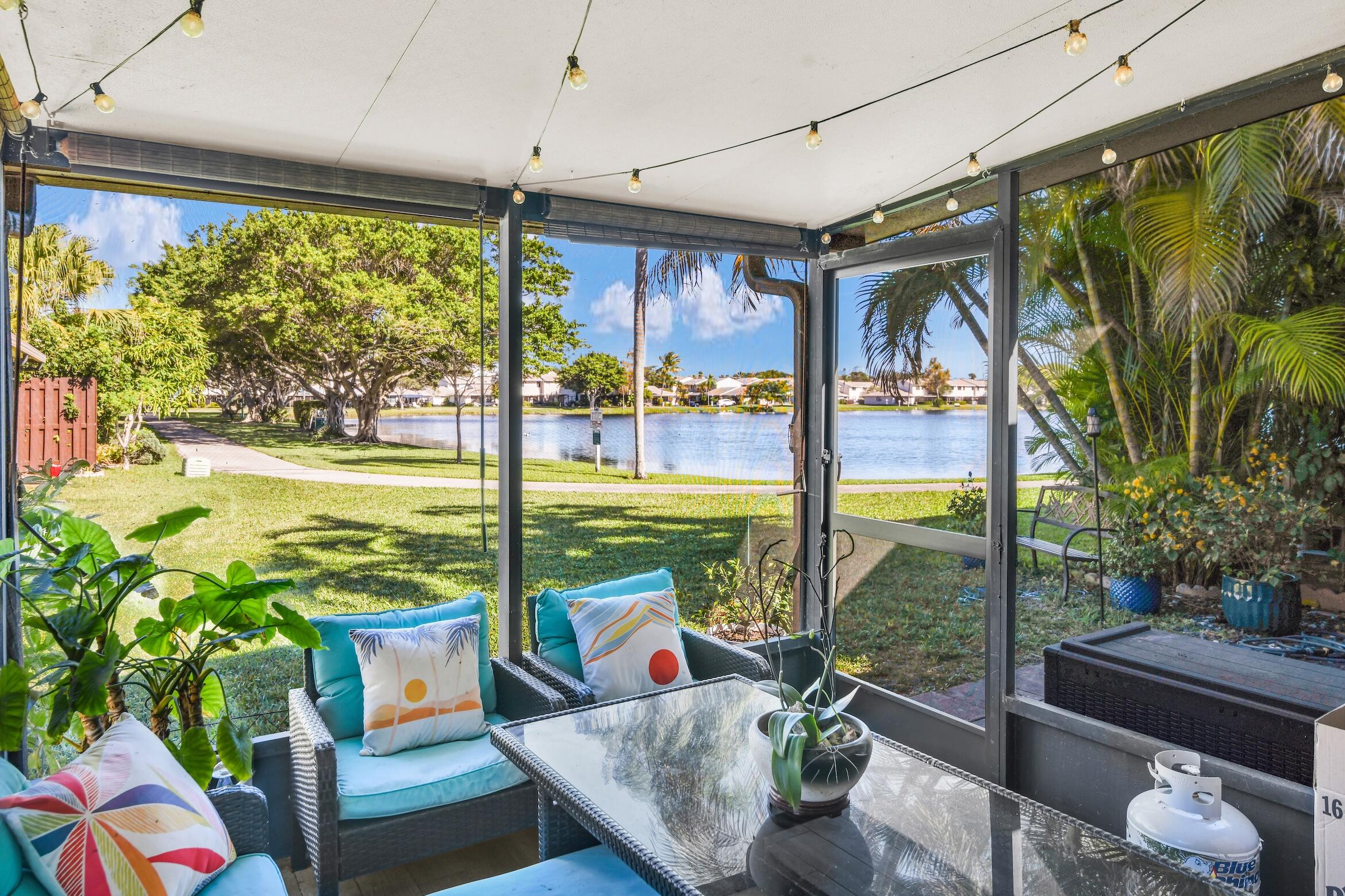 5347 Tennis Lane, Unit 5347 Delray Beach, FL 33484 - Photo 27 of 41 a outdoor living space with furniture