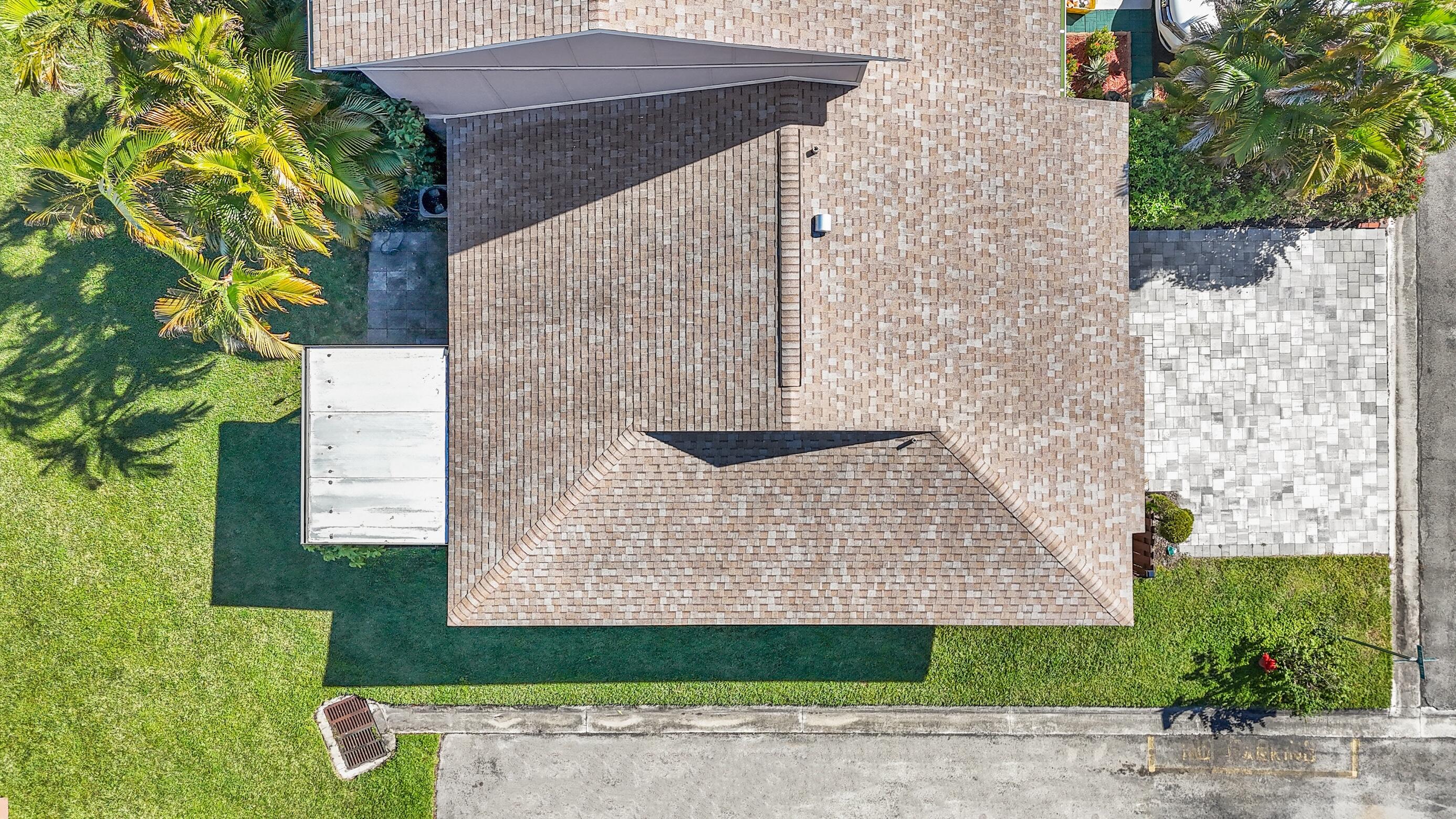 5347 Tennis Lane, Unit 5347 Delray Beach, FL 33484 - Photo 33 of 41 a view of a patio with a yard