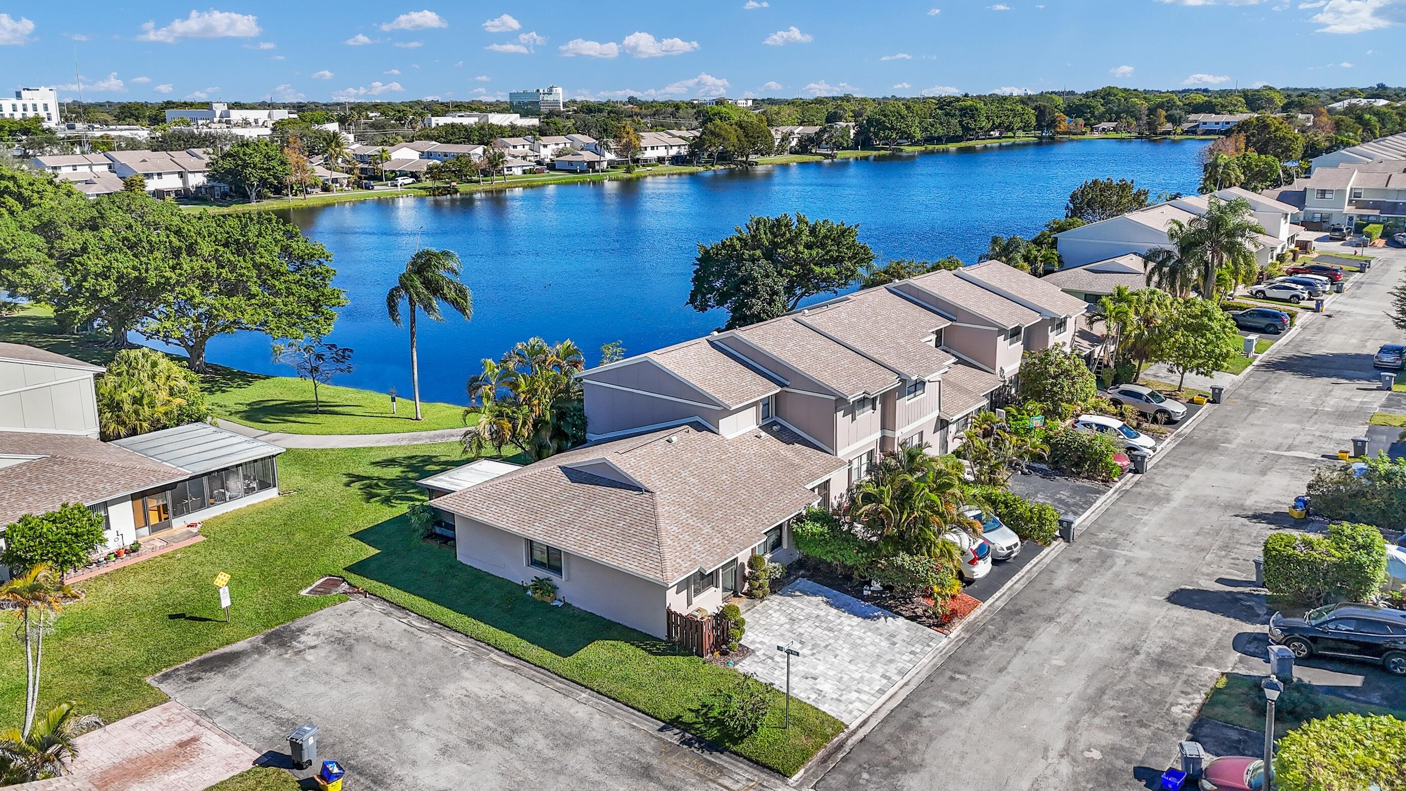 5347 Tennis Lane, Unit 5347 Delray Beach, FL 33484 - Photo 34 of 41 an aerial view of a house with a lake view
