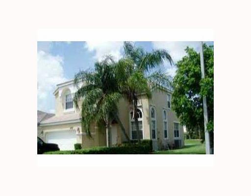 6797 Ashburn Ridge Lake Lake Worth, FL 33467 - Photo 2 of 4 a black and white photo of a house