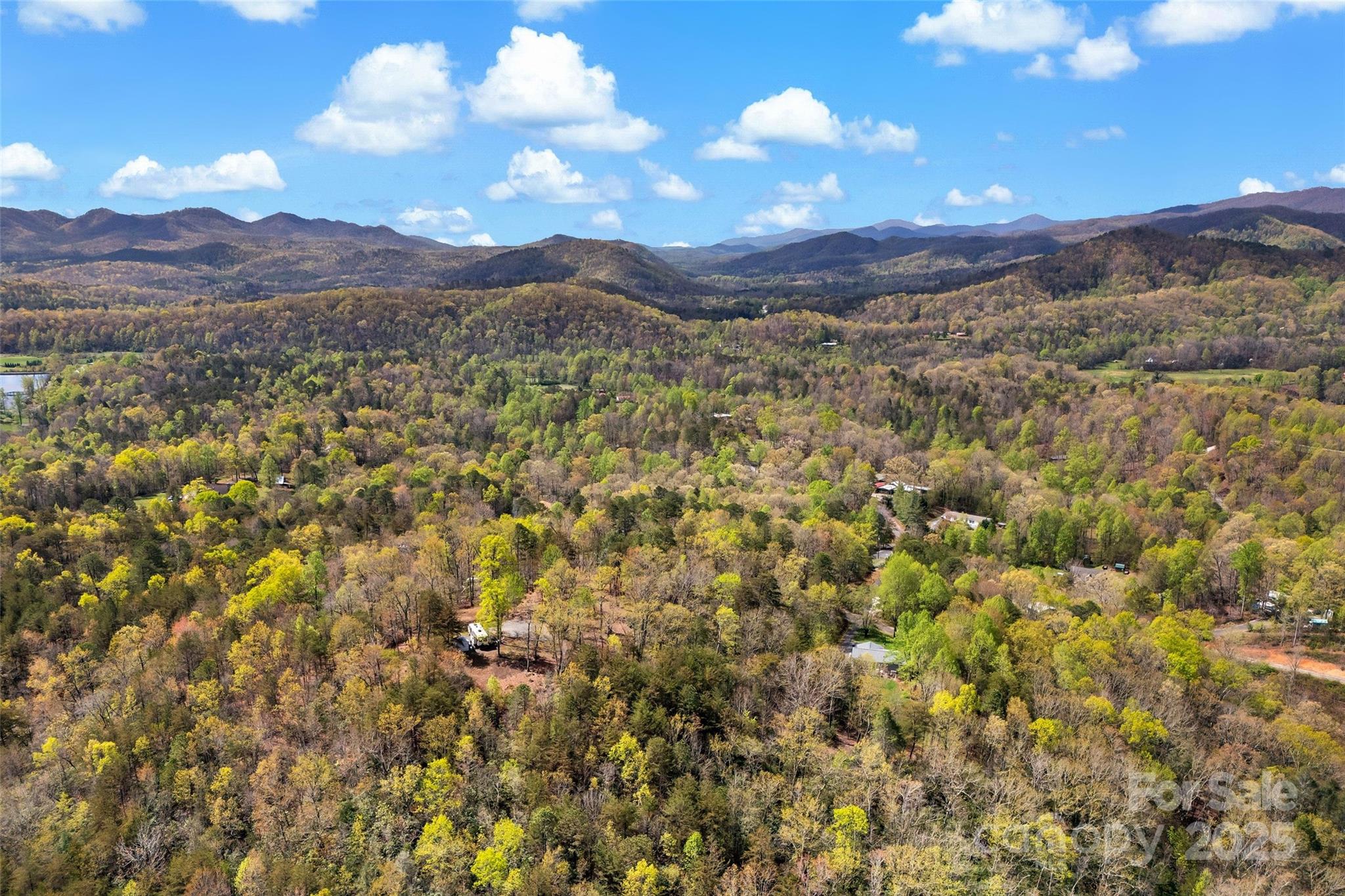 690 Hidden Acres Drive Marion, NC 28752 - Photo 7 of 12 a view of a mountain with sunset in the background