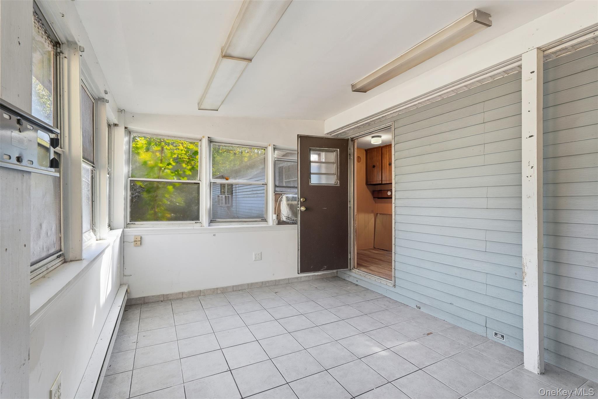 215 Old Rte 32 Highland Mills, NY 10930 - Photo 29 of 34 a view of an empty room with window and cabinet