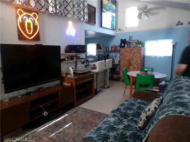 a bathroom with a sink toilet and a mirror