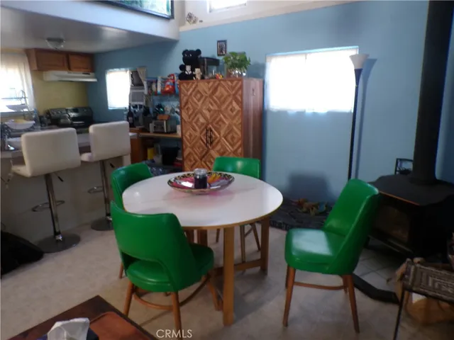 a backyard with table and chairs