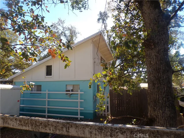 a house with trees in front of it