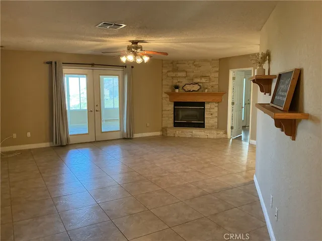 a view of a livingroom with a fireplace
