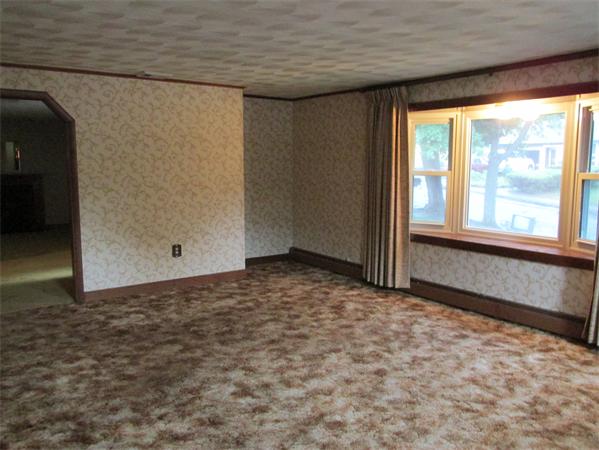 7 Roman Road Woburn, MA 01801 - Photo 8 of 19 an empty room with a window