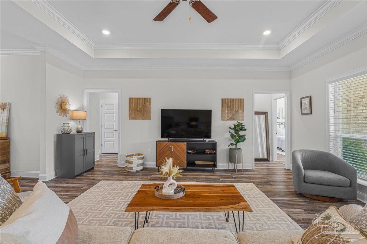 441 Broadleaf Circle Cantonment, FL 32533 - Photo 12 of 42 a living room with furniture and a flat screen tv
