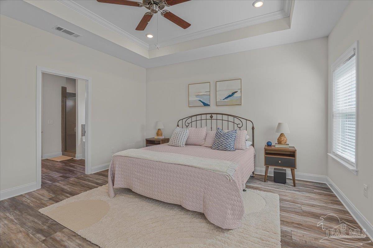 441 Broadleaf Circle Cantonment, FL 32533 - Photo 20 of 42 a bedroom with a bed and a window