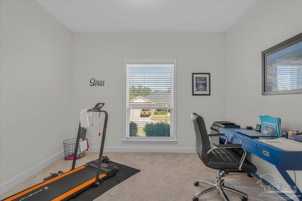 441 Broadleaf Circle Cantonment, FL 32533 - Photo 30 of 42 a view of a workspace with furniture and a window