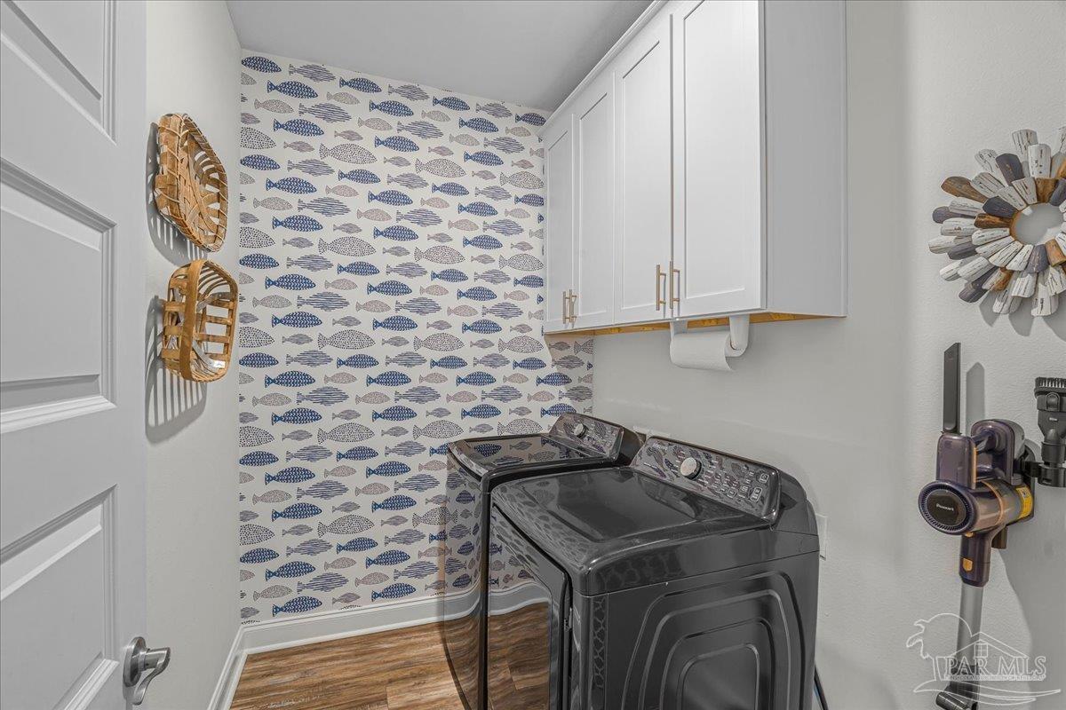 441 Broadleaf Circle Cantonment, FL 32533 - Photo 33 of 42 a kitchen with a sink and cabinets