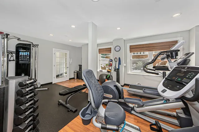 a view of roof deck with patio