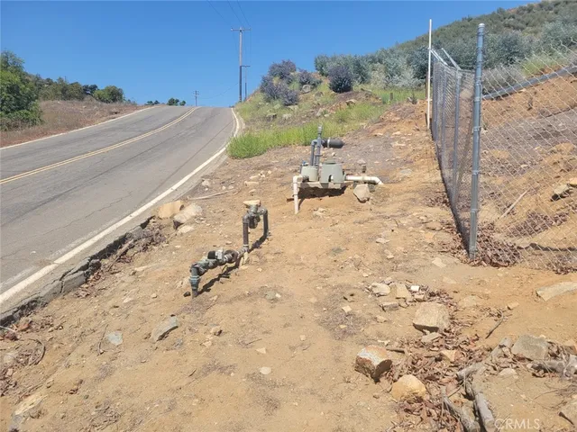 a view of a backyard of the road and a mountain view