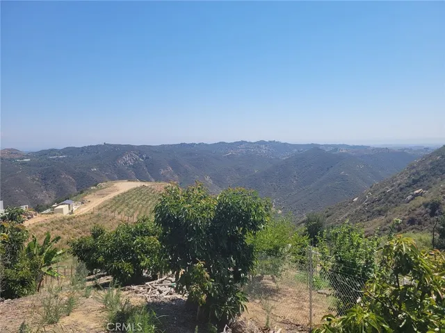 a view of a city with mountains in the background
