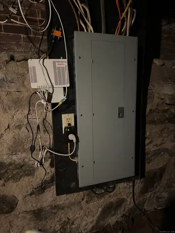 a view of a room with rack and wooden floor