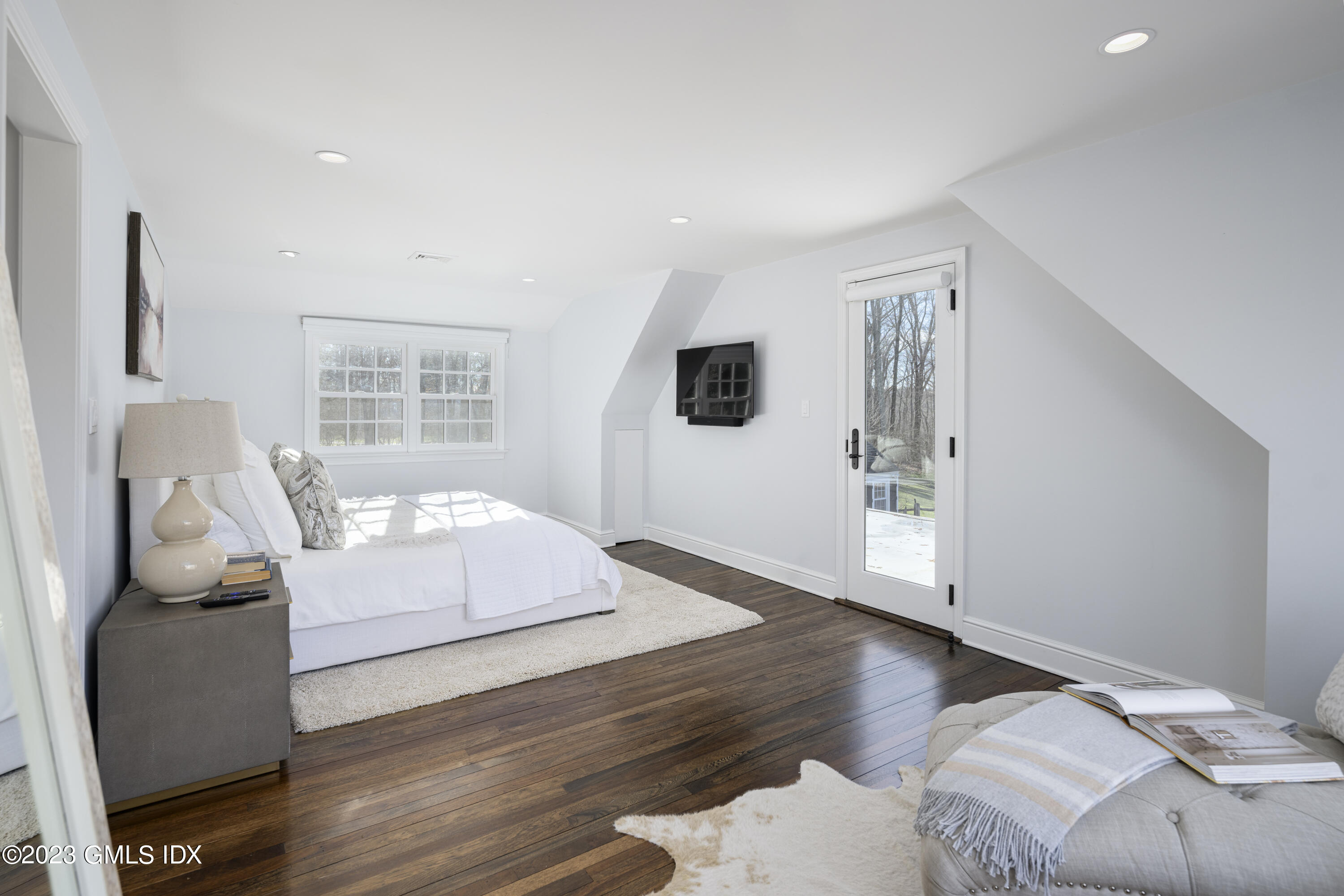 156 Pinewood Road Stamford, CT 06903 - Photo 18 of 28 a bedroom with furniture and a window