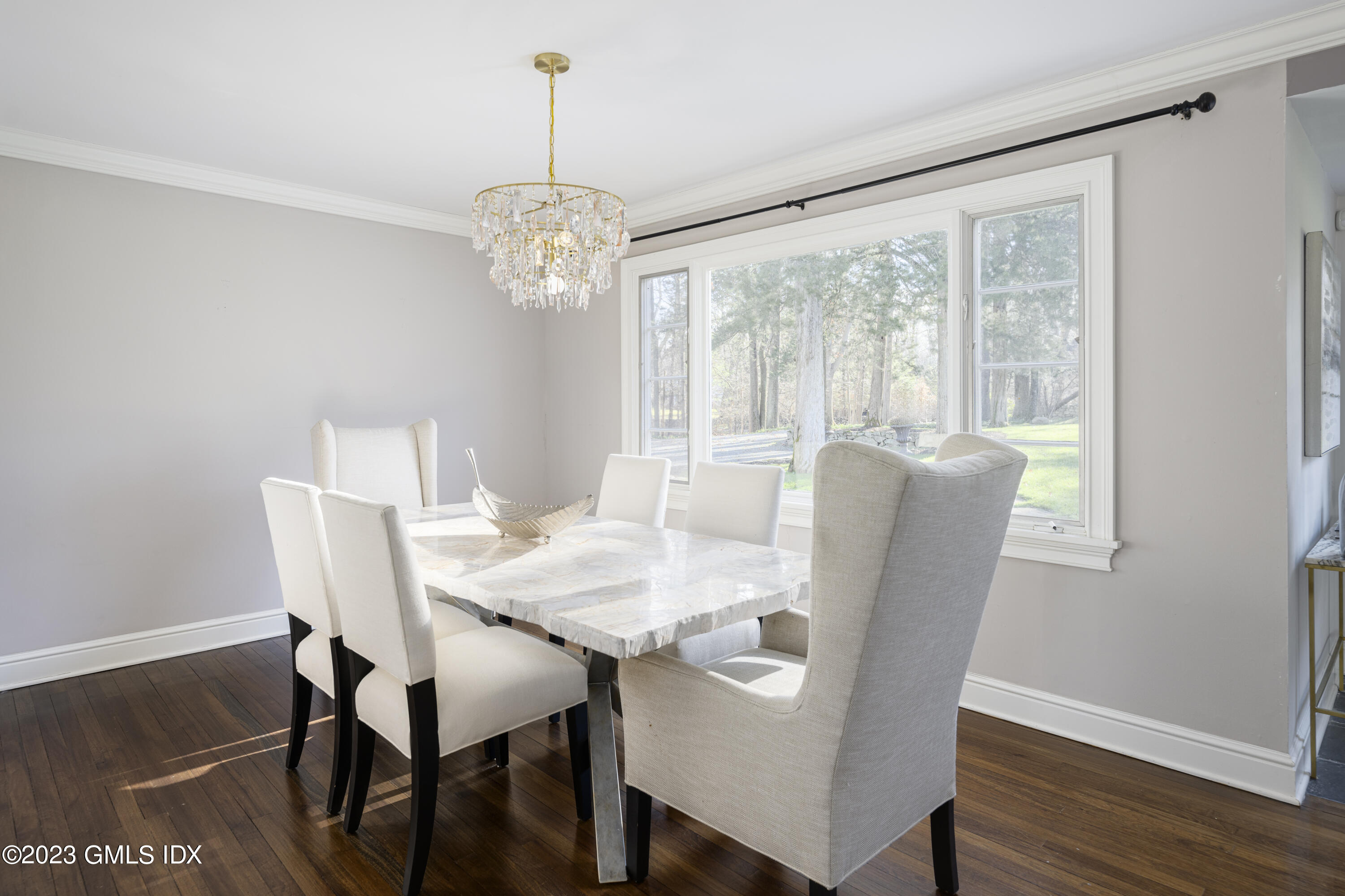 156 Pinewood Road Stamford, CT 06903 - Photo 5 of 28 a view of a dining room with furniture window and wooden floor