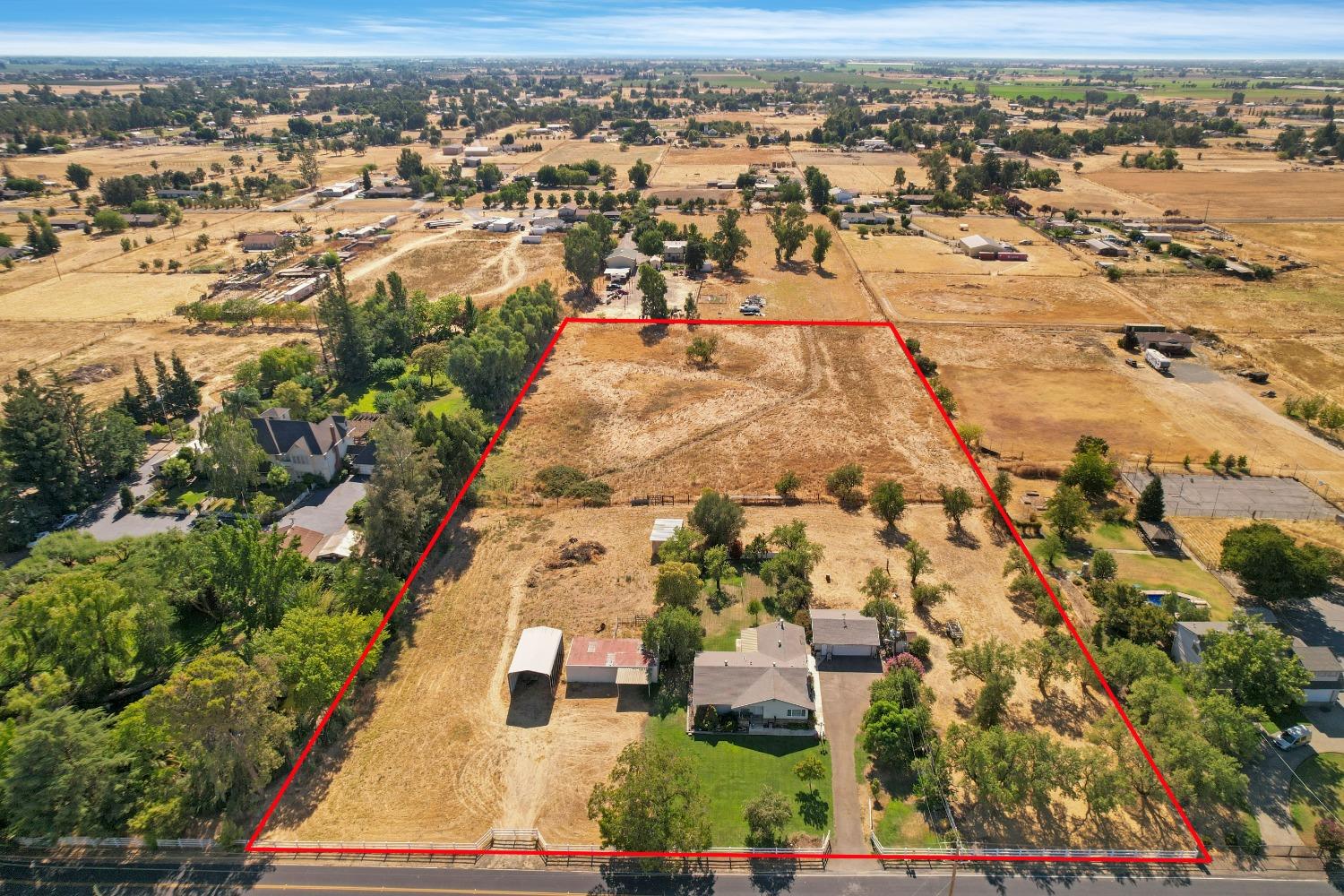 25055 North Watkinson Road Acampo, CA 95220 - Photo 1 of 1 an aerial view of residential houses with outdoor space