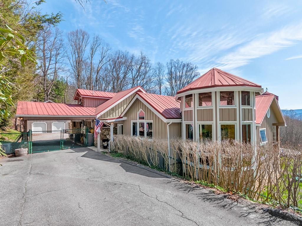 950 Walker Road Waynesville, NC 28786 - Photo 28 of 29 a front view of a house with a yard
